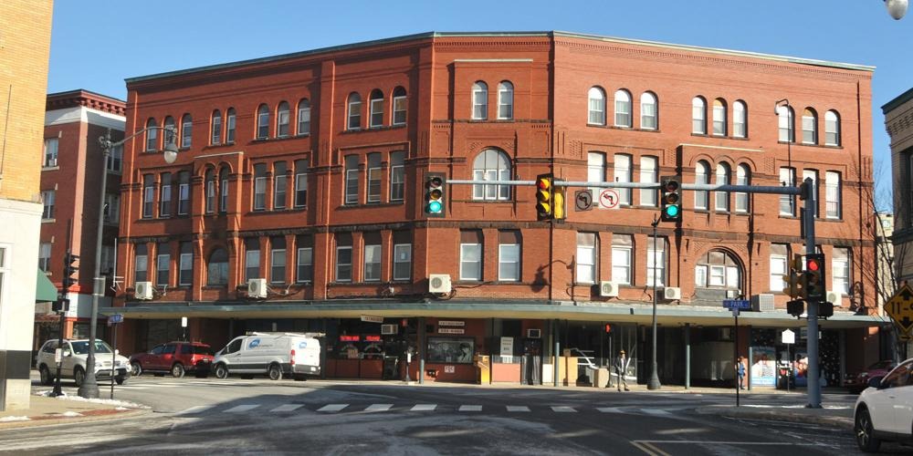 The historic Bates Building in downtown Attleboro, MA, formerly the Bates Opera House, featuring preserved classic architecture and cultural significance.